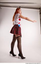 TINA STANDING POSE WITH BASEBALL BAT #2